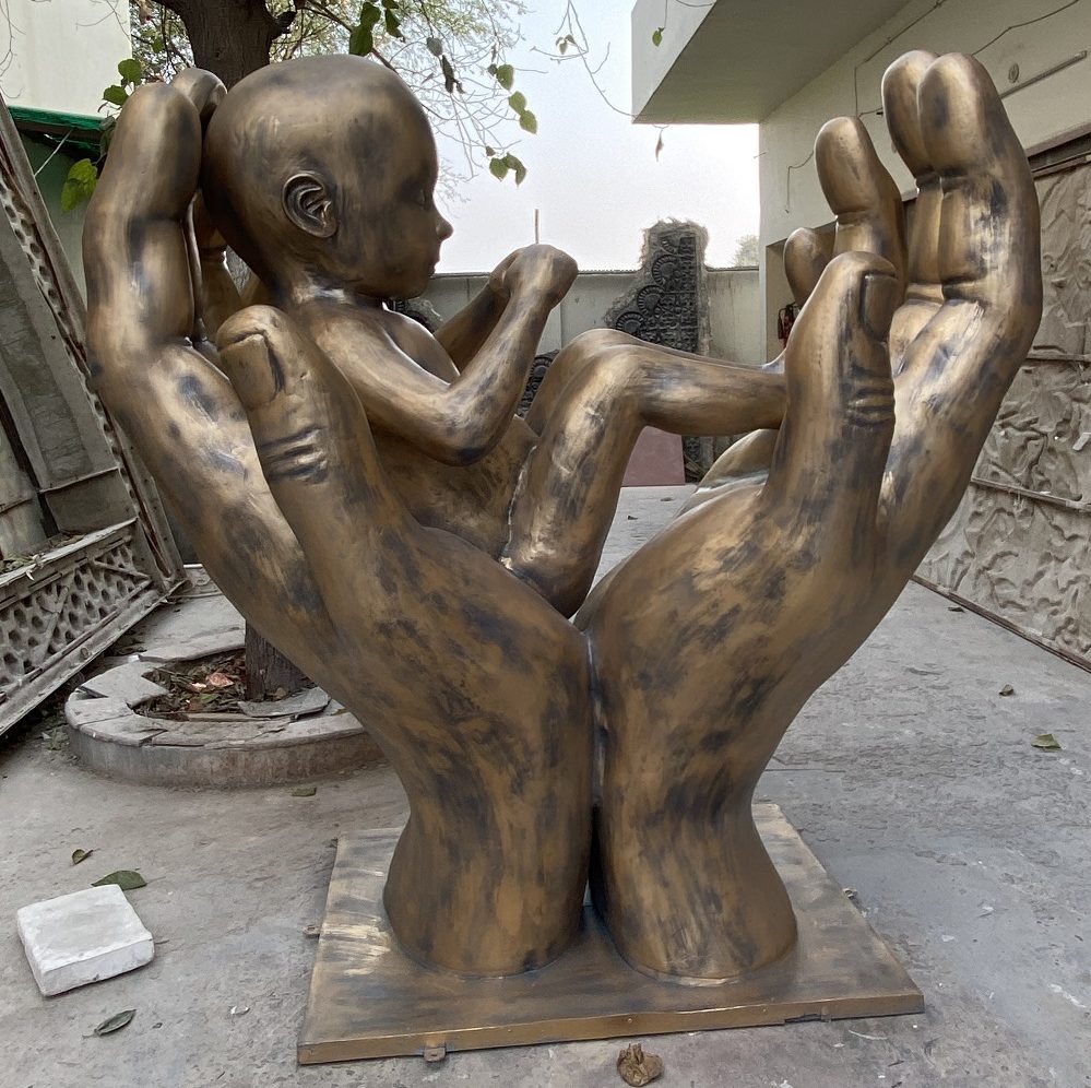 FRP 3D Hand with Child Sculpture